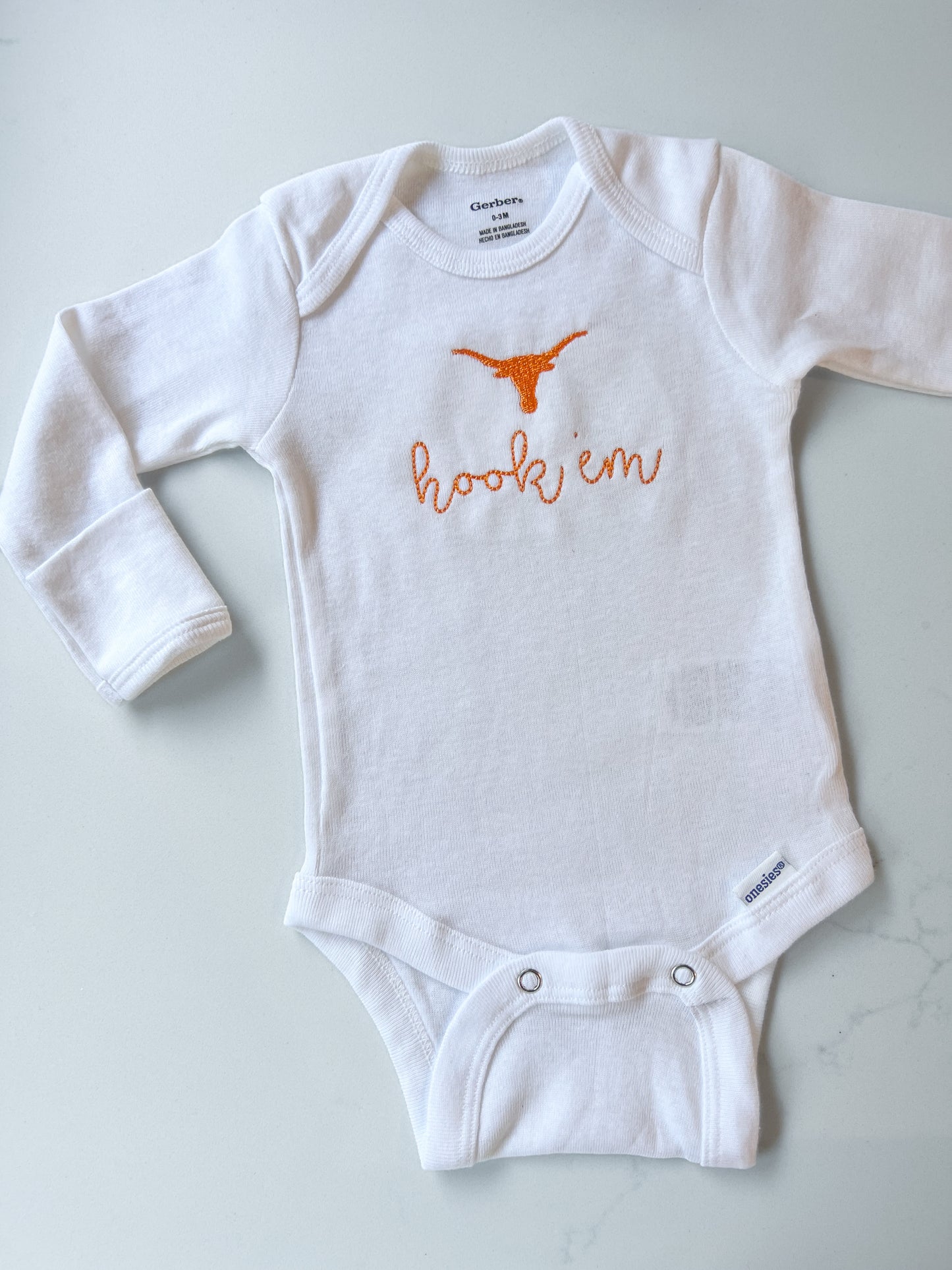 H O O K ‘E M onesie